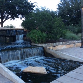 Flowing fountain across from SAMFA